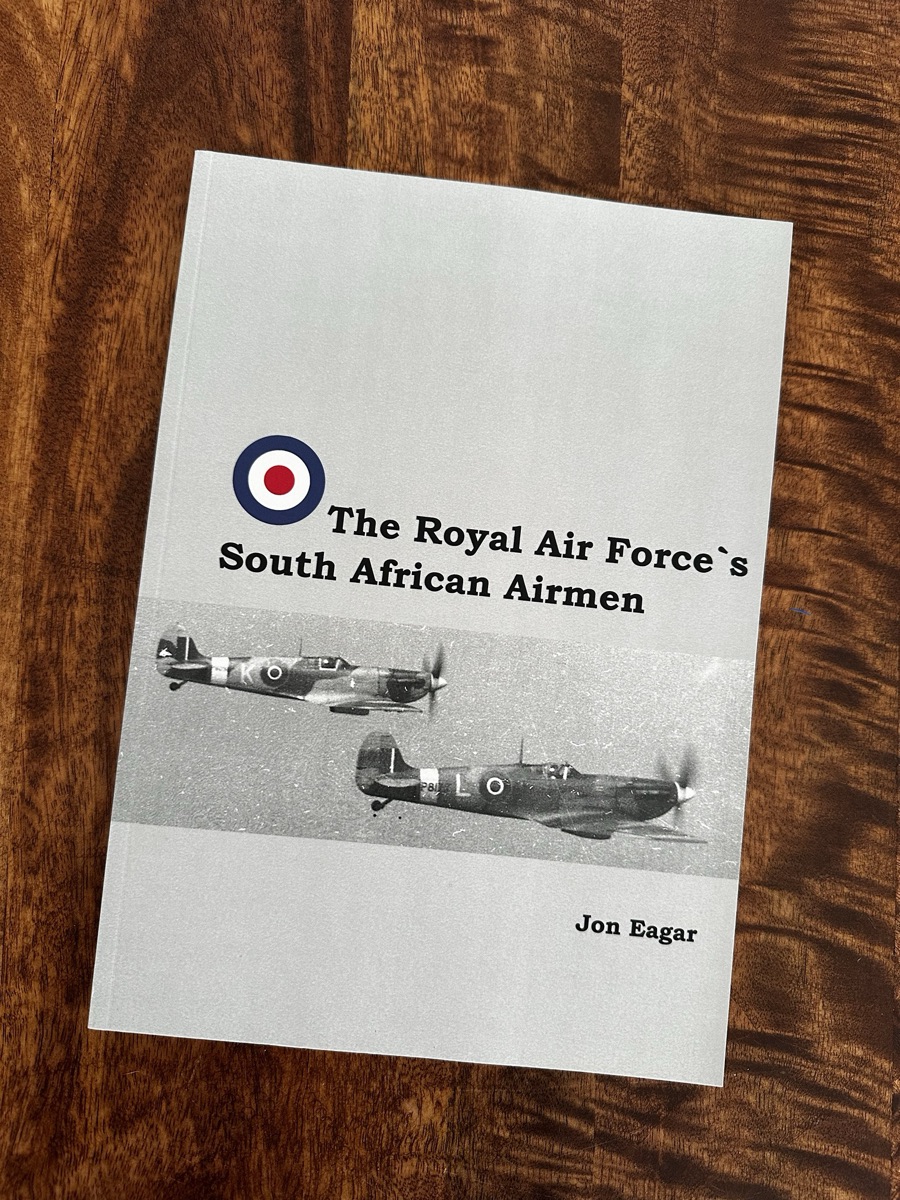 The cover of The Royal Air Force’s South African Airmen by Jon Eagar: two Spitfires in flight beneath an RAF roundel